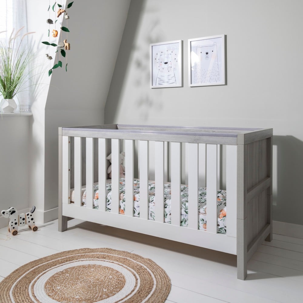 white cot bed and mattress